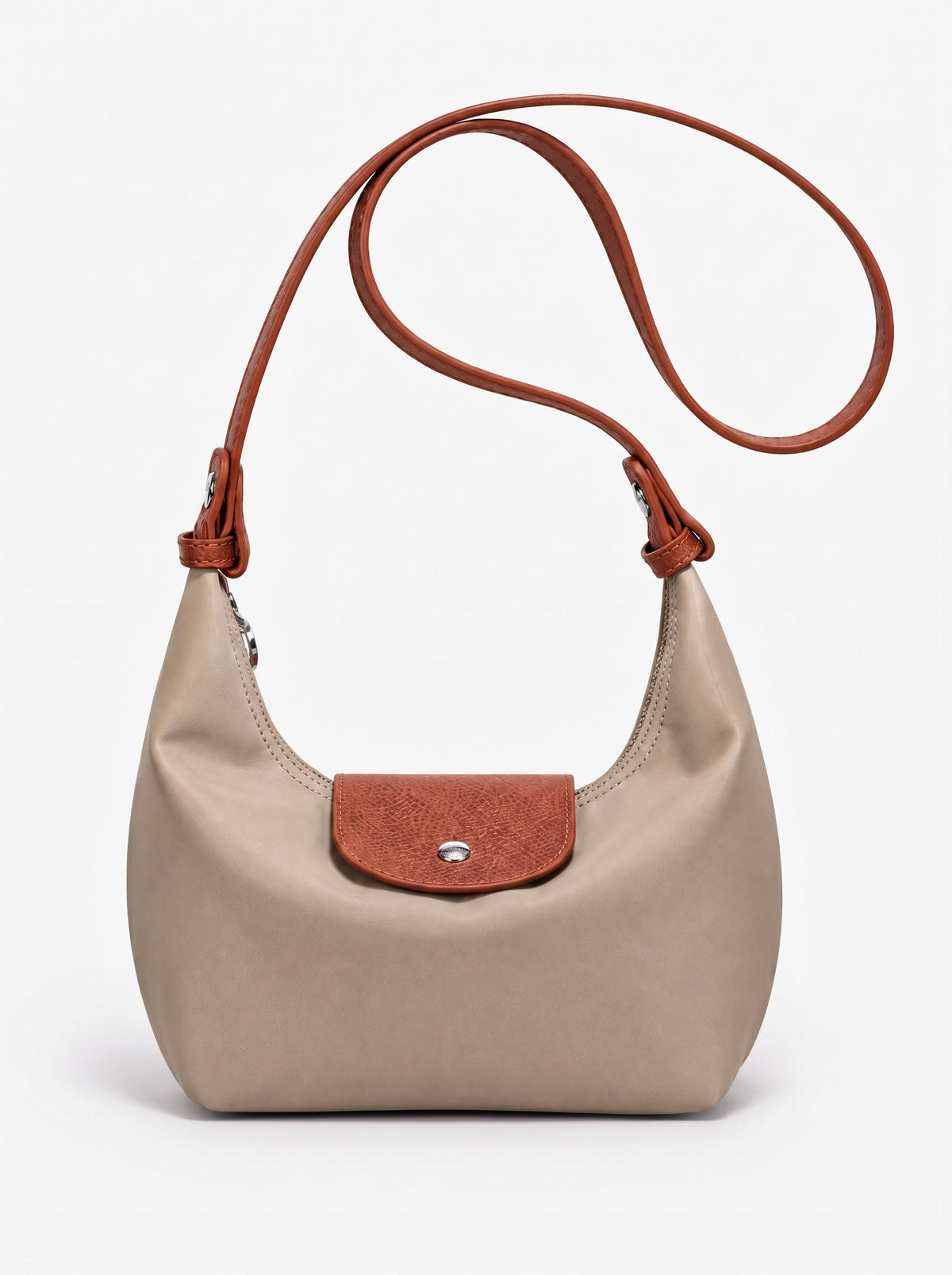 The Paris Hobo — Beige, with the long strap clipped on for crossbody